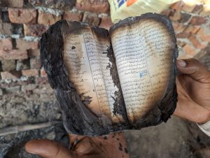 Copy-of-bible-burnt-in-Sat-Sangat-church-photo-taken-on-Aug-19-by-Al-Jazeera